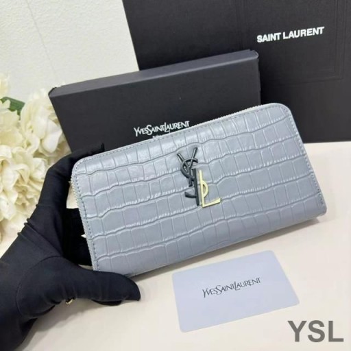 Yves Saint Laurent Large Cassandra Deconstruct Zip Around Wallet In Crocodile Embossed Leather Sky Blue