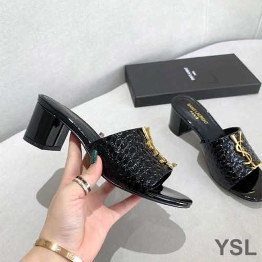 Yves Saint Laurent Monogram Heeled Slides In Stone Grain Leather Black