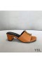 Yves Saint Laurent Monogram Heeled Slides In Calf Leather Brown