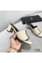 Yves Saint Laurent Monogram Heeled Slides In Calf Leather White