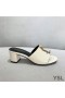 Yves Saint Laurent Monogram Heeled Slides In Calf Leather White
