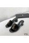 Yves Saint Laurent Monogram Heeled Slides In Patent Leather Black