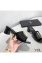 Yves Saint Laurent Monogram Heeled Slides In Stone Grain Leather Black