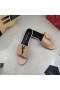 Yves Saint Laurent Monogram Slides In Patent Leather Beige