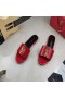 Yves Saint Laurent Monogram Slides In Patent Leather Red