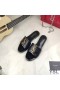 Yves Saint Laurent Monogram Slides In Stone Grain Leather Black