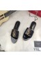 Yves Saint Laurent Monogram Slides In Stone Grain Leather Black