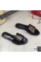 Yves Saint Laurent Monogram Slides In Stone Grain Leather Black