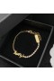 Yves Saint Laurent Opyum Charm Bracelet In Metal and Rhinestones Gold
