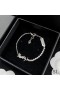 Yves Saint Laurent Opyum Charm Bracelet In Metal and Rhinestones Silver