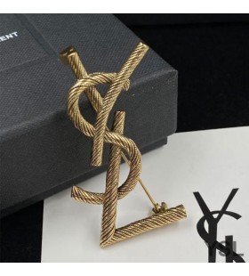 Yves Saint Laurent Opyum Brooch In Twisted Metal Gold