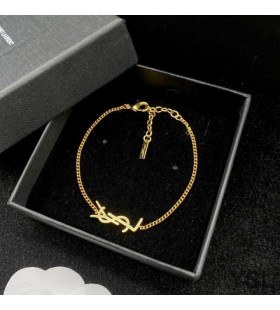 Yves Saint Laurent Opyum Charm Bracelet In Metal Gold