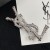 Yves Saint Laurent Opyum Broche Em Berbere Metal Prata