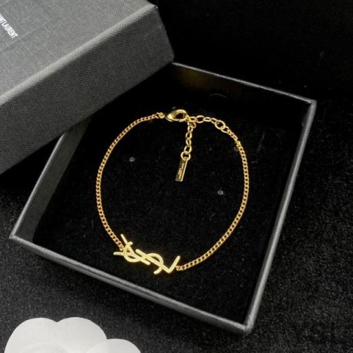 Yves Saint Laurent Opyum Charm Bracelet I Miotail Ór