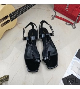 Yves Saint Laurent Cassandra Flat Sandals with Toehold Loop In Patent Leather Black