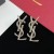 Yves Saint Laurent Opyum Cercei În Șarpe De Metal De Argint