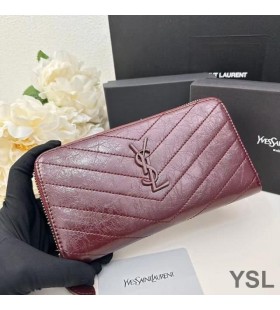Yves Saint Laurent Large Cassandra Zip Around Wallet In Crinkled Matelasse Leather Burgundy