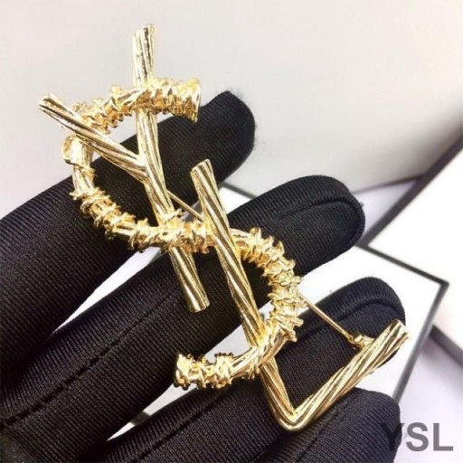 Yves Saint Laurent Opyum Brosch I Rep Metall Guld