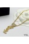 Metal ve Kristal Altından Yves Saint Laurent Afyon Kalp Kolye