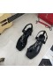 Yves Saint Laurent Cassandra Sandalias Planas con punto de Apoyo Lazo En Cuero Liso Negro