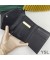 Yves Saint Laurent Monogram Trifold Card Case In Grained Matelasse Leather Black