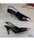 إيف سان لوران نجمة المساء مضخات Slingback في براءات الاختراع والجلود السوداء