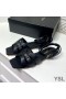 Yves Saint Laurent Tribute Platte Sandalen In Glad Leder Zwart