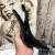 Yves Saint Laurent Opyum Slingback Pumps In lak Leer met Gouden Hak Zwart