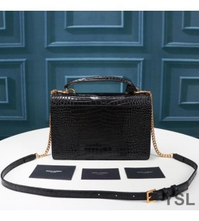 Yves Saint Laurent Keskipitkän Sunset Olkalaukku Krokotiili-Kohokuvioitu Kiiltävä Nahka Musta/Kulta