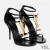Yves Saint Laurent Cassandra 100 Sandaalit Kiiltonahka kanssa Gold Logo Musta