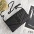 Yves Saint Laurent Monogramme De La Chaîne Porte-Monnaie Dans Grainé Matelassé En Cuir Noir
