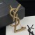 Yves Saint Laurent Opyum Broche En Métal Tordu Or