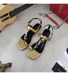 Yves Saint Laurent Cassandra Flache Sandalen mit Brückenkopf Loop-In Glatter Leder-Gold