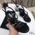 Yves Saint Laurent Cassandra Keil Espadrilles Leder Schwarz/Gold